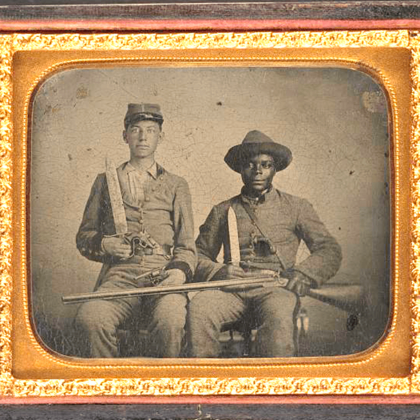Two men in uniform are posing for a photo.